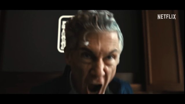 Video Reference: man, close-up, shouting, angry, dramatic, interior, dim light, face, gray hair, film still, netflix, watermark