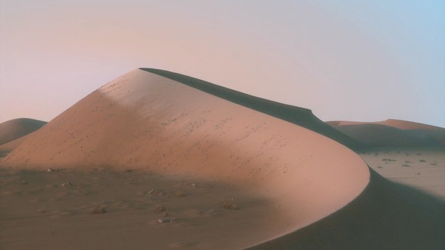 Video Reference: desert, sand dune, landscape, dunes, arid, nature, sky, sunset, minimal, wilderness, dry, sand, outdoors, scenic