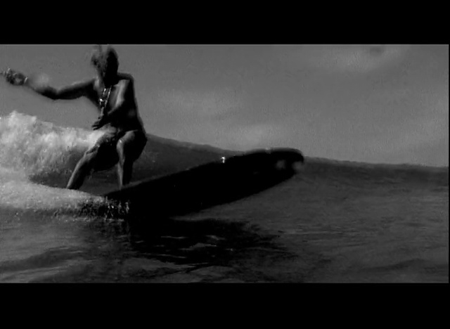 Video Reference: Water, Surfing, Surfboard, Flash photography, Sky, Swimwear, Recreation, Surfing Equipment, Sports equipment, Wind wave