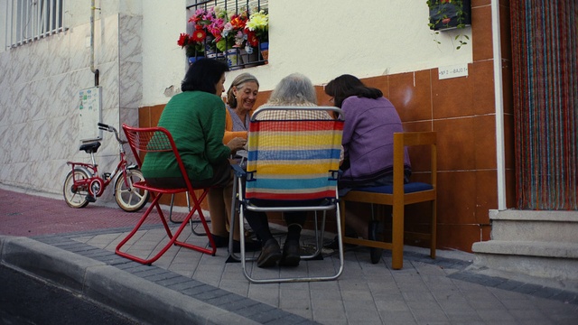 Video Reference: Bicycle, Chair, Wheel, Door, Tire, Art, Sidewalk, Leisure, Bicycle wheel, Road