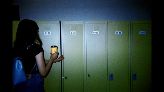 Video Reference: Locker, Gesture, Luggage and bags, Gas, Elevator, Electric blue, Bag, Event, Machine, Font