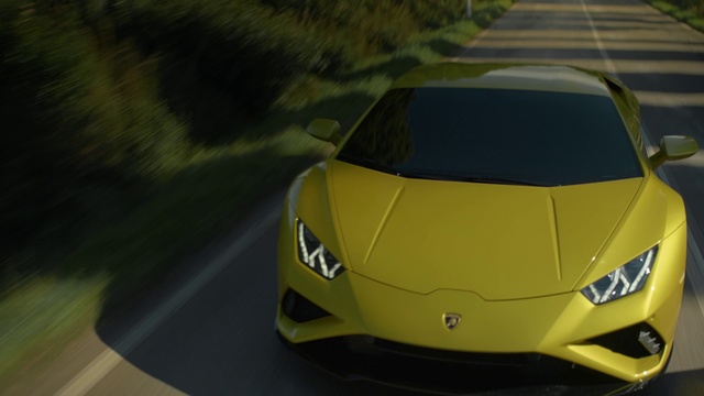 Video Reference: Vehicle, Wheel, Hood, Tire, Car, Automotive lighting, Grille, Automotive design, Yellow, Automotive tire