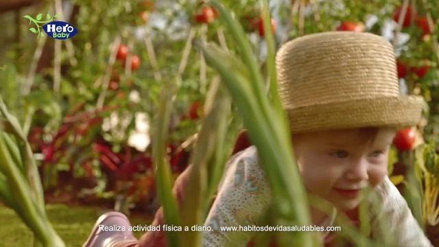 Video Reference: Plant, Smile, Hat, People in nature, Flower, Happy, Terrestrial plant, Grass, Cap, Toddler