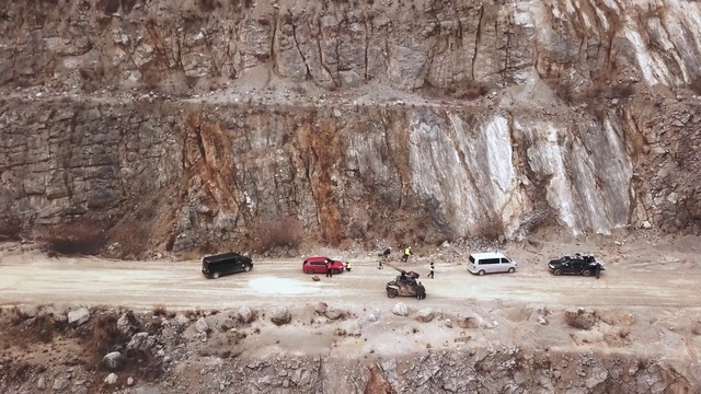 Video Reference: Car, Vehicle, Bedrock, Motor vehicle, Plant, Terrain, Landscape, Tree, Geological phenomenon, Automotive tire