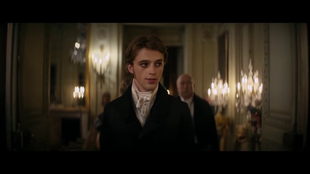 Video Reference: Candle, Flash photography, Coat, Formal wear, Event, Darkness, Candle holder, Suit, Facial hair, Room