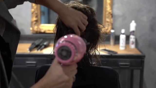 Video Reference: Hairstyle, Eyelash, Ear, Fashion, Gesture, Finger, Gadget, Audio equipment, Hearing, Black hair