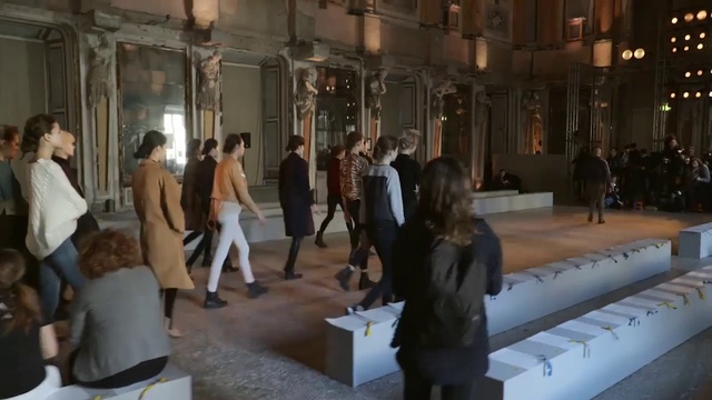 Video Reference: Trousers, Fashion, Interior design, Event, Leisure, Art, Fashion design, Fun, Luggage and bags, Suit