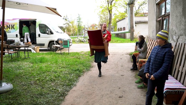 Video Reference: Plant, Vehicle, Green, Hat, Tire, Tree, Road surface, Asphalt, Grass, Sun hat