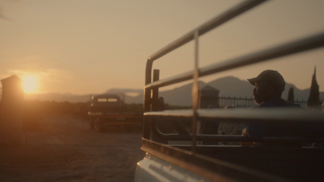 Video Reference: Sky, Cloud, Car, Hat, Tire, Sunlight, Fedora, Sun hat, Sunset, Sunrise