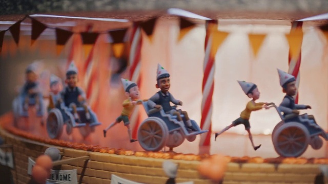 Video Reference: Wheel, Tire, Toy, Orange, Motor vehicle, Automotive wheel system, Event, Art, Fun, Team