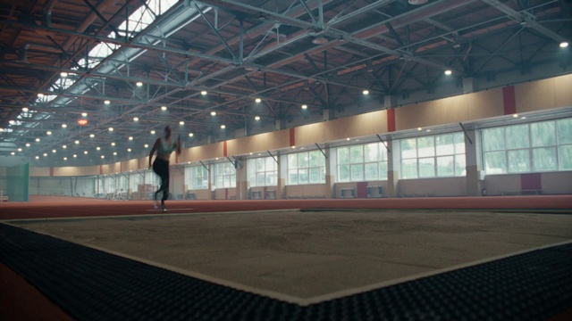 Video Reference: Field house, Hall, Floor, Building, Shade, Flooring, Ceiling, Sport venue, Beam, Stadium