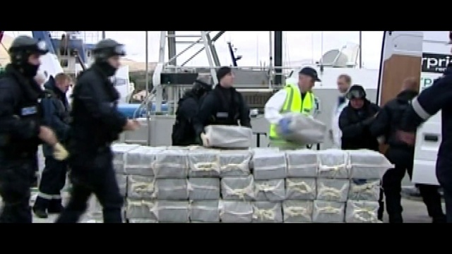 Video Reference: Motor vehicle, Hat, Event, Crowd, Recreation, Automotive design, Public event, Stage equipment, Flooring, Suit