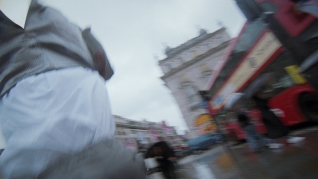 Video Reference: Sky, Cloud, Building, City, Travel, Event, Road surface, Road, Street, Pedestrian
