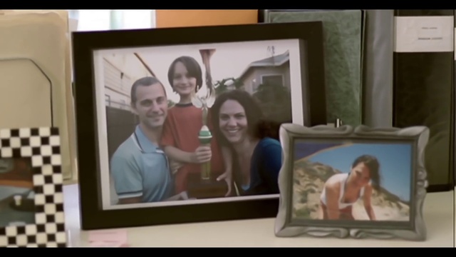 Video Reference: Smile, Facial expression, Picture frame, Product, Art, T-shirt, Fun, Event, Electronic device, Visual arts