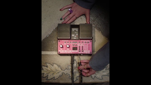 Video Reference: Finger, Font, Gas, Tints and shades, Flash photography, Electronic device, Magenta, Wrist, Carmine, Brick