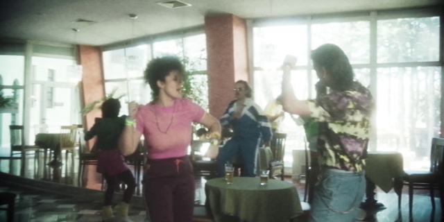 Video Reference: T-shirt, Event, Fun, Chair, Balance, Entertainment, Waist, Sharing, Table, Room