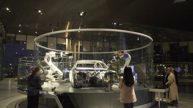 Video Reference: Clothing, Vehicle, Automotive lighting, Automotive design, Motor vehicle, Science, Event, Engineering, Automotive exterior, City