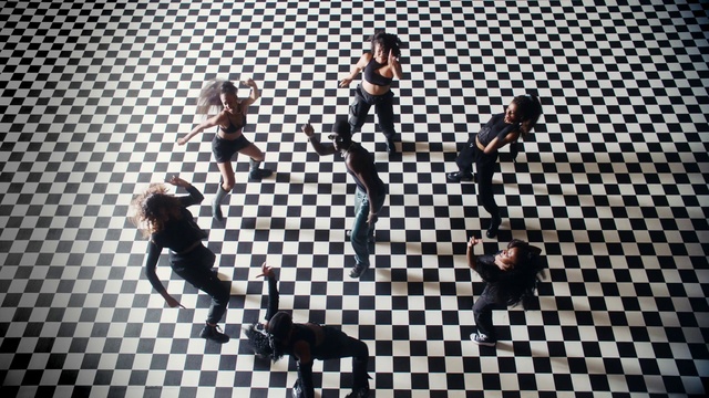 Video Reference: World, Flooring, Floor, Font, Indoor games and sports, Pattern, Fun, Snapshot, Recreation, Event