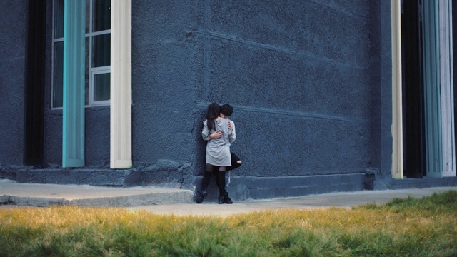 Video Reference: Road surface, Sidewalk, Street fashion, Tints and shades, Grass, City, Leisure, Road, Electric blue, Luggage and bags