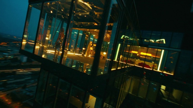 Video Reference: Building, Electricity, Tower block, Urban design, Tints and shades, Facade, City, Metropolitan area, Symmetry, Glass