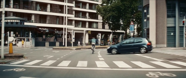 Video Reference: Wheel, Tire, Land vehicle, Car, Building, Vehicle, Infrastructure, Lighting, Zebra crossing, Asphalt