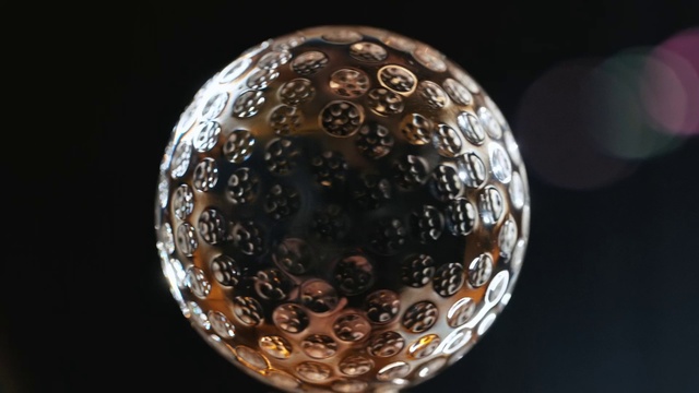 Video Reference: Ball, Ornament, Glass, Art, Circle, Metal, Ball, Fashion accessory, Christmas ornament, Event