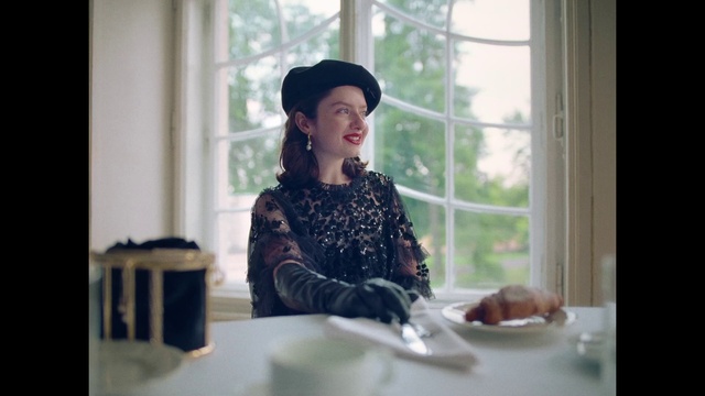 Video Reference: Window, Hat, Textile, Table, Tableware, Smile, Fashion design, Plate, Fun, Curtain