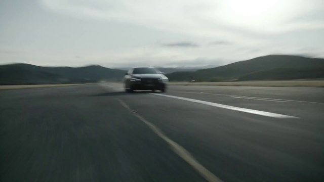 Video Reference: Cloud, Land vehicle, Car, Sky, Vehicle, Mountain, Motor vehicle, Asphalt, Highland, Road surface