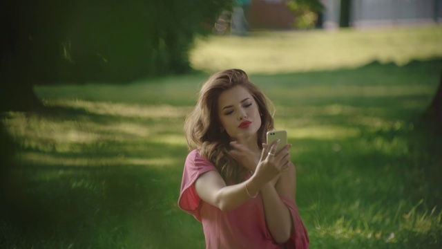 Video Reference: Hair, Lip, Plant, Flash photography, Happy, Sunlight, Grass, Gesture, People in nature, Grassland
