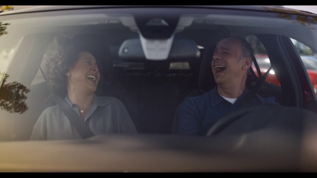 Video Reference: Smile, Motor vehicle, Car, Automotive design, Automotive exterior, Flash photography, Automotive mirror, Head restraint, Vehicle door, Personal luxury car