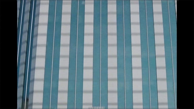 Video Reference: Azure, Rectangle, Textile, Sleeve, Tartan, Grey, Plaid, Aqua, Material property, Symmetry