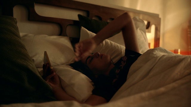 Video Reference: Comfort, Flash photography, Pillow, Gesture, Dress, Linens, Human leg, Elbow, Bed, Bedding