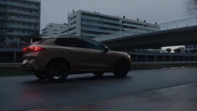 Video Reference: SUV, car, road, wet pavement, city street, overpass, apartment buildings, urban, driving, dusk, traffic, vehicle