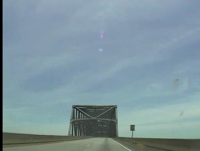 Video Reference: Sky, Cloud, Daytime, Road surface, Asphalt, Mode of transport, Thoroughfare, Tar, Atmospheric phenomenon, Line