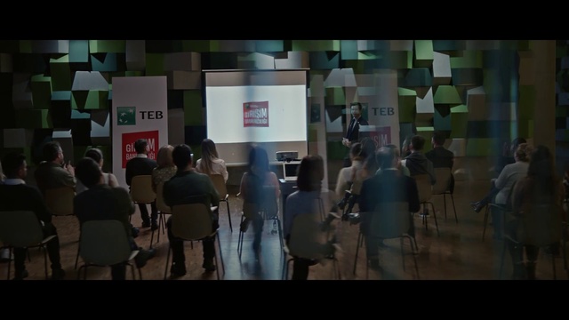 Video Reference: Chair, Font, Sharing, Event, Art, Space, Crowd, Job, Presentation, Visual arts