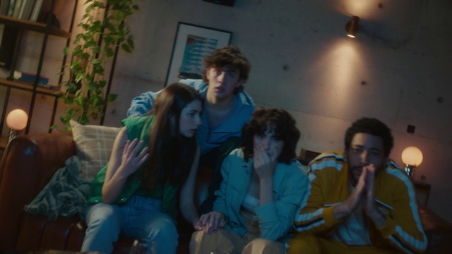 Video Reference: Jeans, Plant, Picture frame, Comfort, Fun, Leisure, T-shirt, Couch, Event, Happy