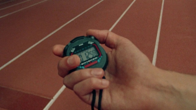 Video Reference: Hand, Finger, Measuring instrument, Wrist, Thumb, Electric blue, Gadget, Flooring, Nail, Automotive tire