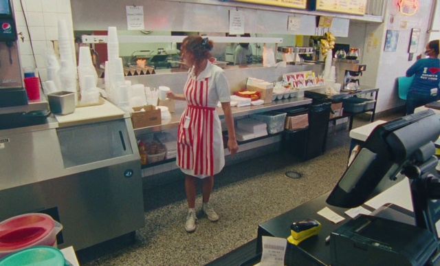 Video Reference: Dress, Countertop, Kitchen, Cabinetry, Flooring, Room, Customer, Kitchen appliance, Machine, Event