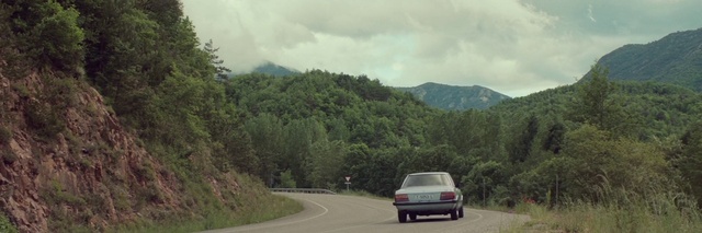 Video Reference: Cloud, Sky, Car, Land vehicle, Vehicle, Automotive tail & brake light, Plant, Mountain, Tire, Automotive lighting