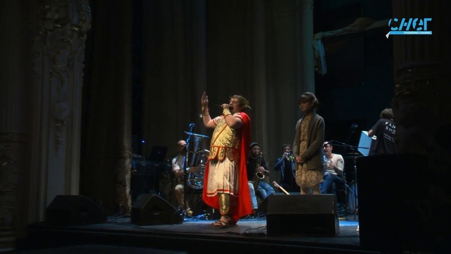 Video Reference: Drum, Chair, Musician, Music, Performing arts, Artist, Musical instrument, Entertainment, Microphone, Curtain