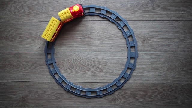 Video Reference: Wood, Jewellery, Font, Electric blue, Circle, Auto part, Metal, Bicycle part, Rim, Fashion accessory