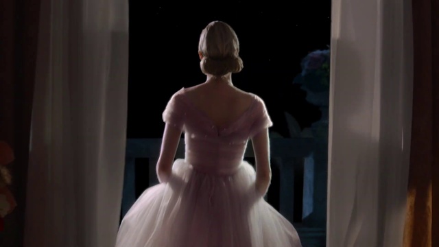 Video Reference: Wedding dress, Toy, Bridal clothing, Flash photography, Sleeve, Bridal party dress, Waist, One-piece garment, Dress, Bride