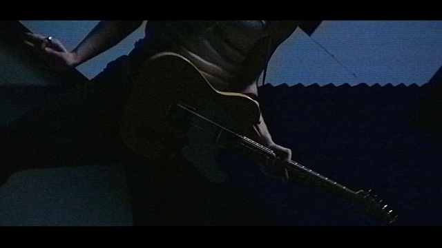 Video Reference: Flash photography, Gesture, Tints and shades, Electric blue, Elbow, Font, Space, Darkness, Human leg, Vehicle door