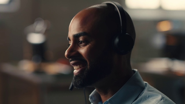 Video Reference: Forehead, Smile, Hearing, Human body, Flash photography, Ear, Peripheral, Eyewear, Audio equipment, Beard