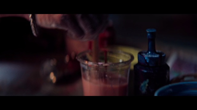 Video Reference: Drink, Alcohol, Liqueur, Alcoholic beverage, Distilled beverage, Darkness, Photography, Glass bottle, Hand, Still life photography