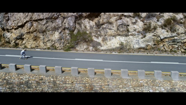 Video Reference: man, street, mountain, road, skateboard 
