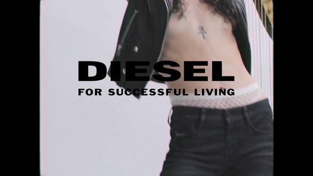 Video Reference: Shoulder, White, Black, Arm, Tattoo, Font, T-shirt, Neck, Waist, Male, Person, Clothing, Woman, Holding, Front, Man, Young, Posing, Standing, Hand, Wearing, Shirt, Girl, Sign, Phone, Player, Text, Fashion