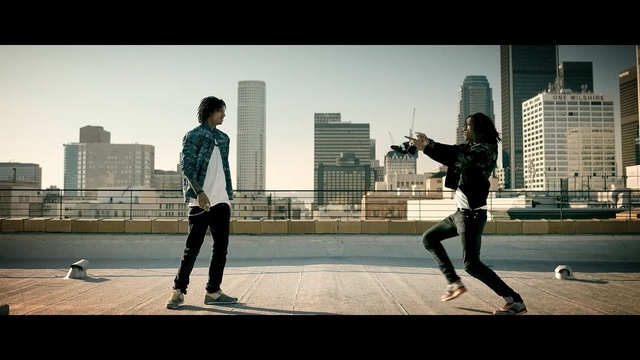 Video Reference: photograph, urban area, sky, photography, male, fun, city, recreation, street, building, Person