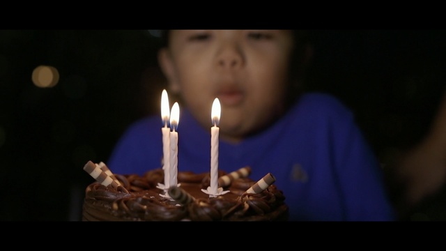 Video Reference: flame, darkness, candle, event, lighting, smile, fun, hanukkah, night, midnight, Person