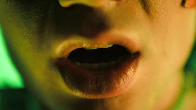 Video Reference: Face, Nose, Close-up, Facial expression, Eye, Green, Mouth, Lip, Head, Skin